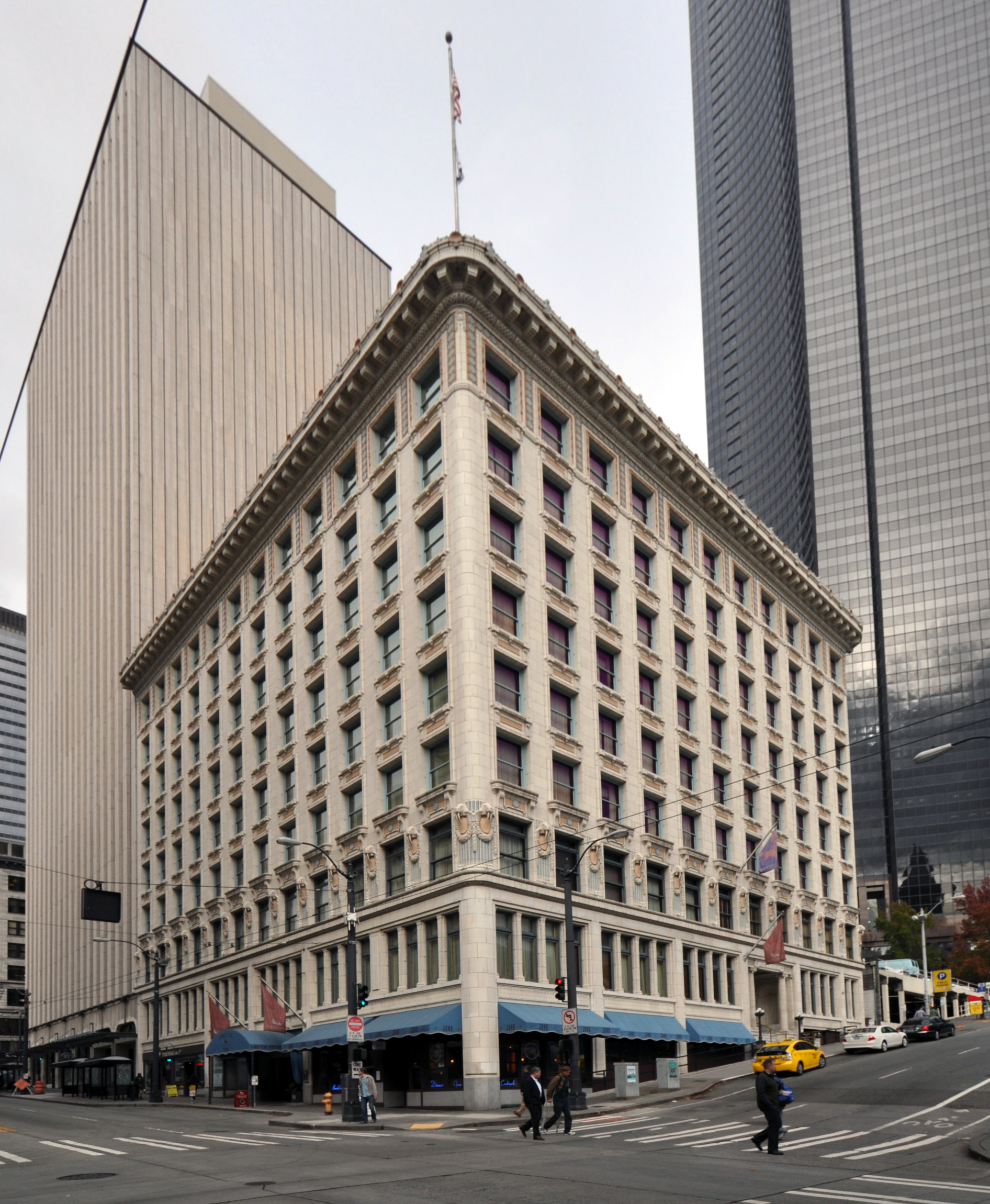 Figure XX:  The Arctic Building in Seattle, WA.  The 1982 walrus tusk repairs were not future-proof:  accelerated deterioration of the walrus heads ensued.  Credit;  Brian Rich, 2013