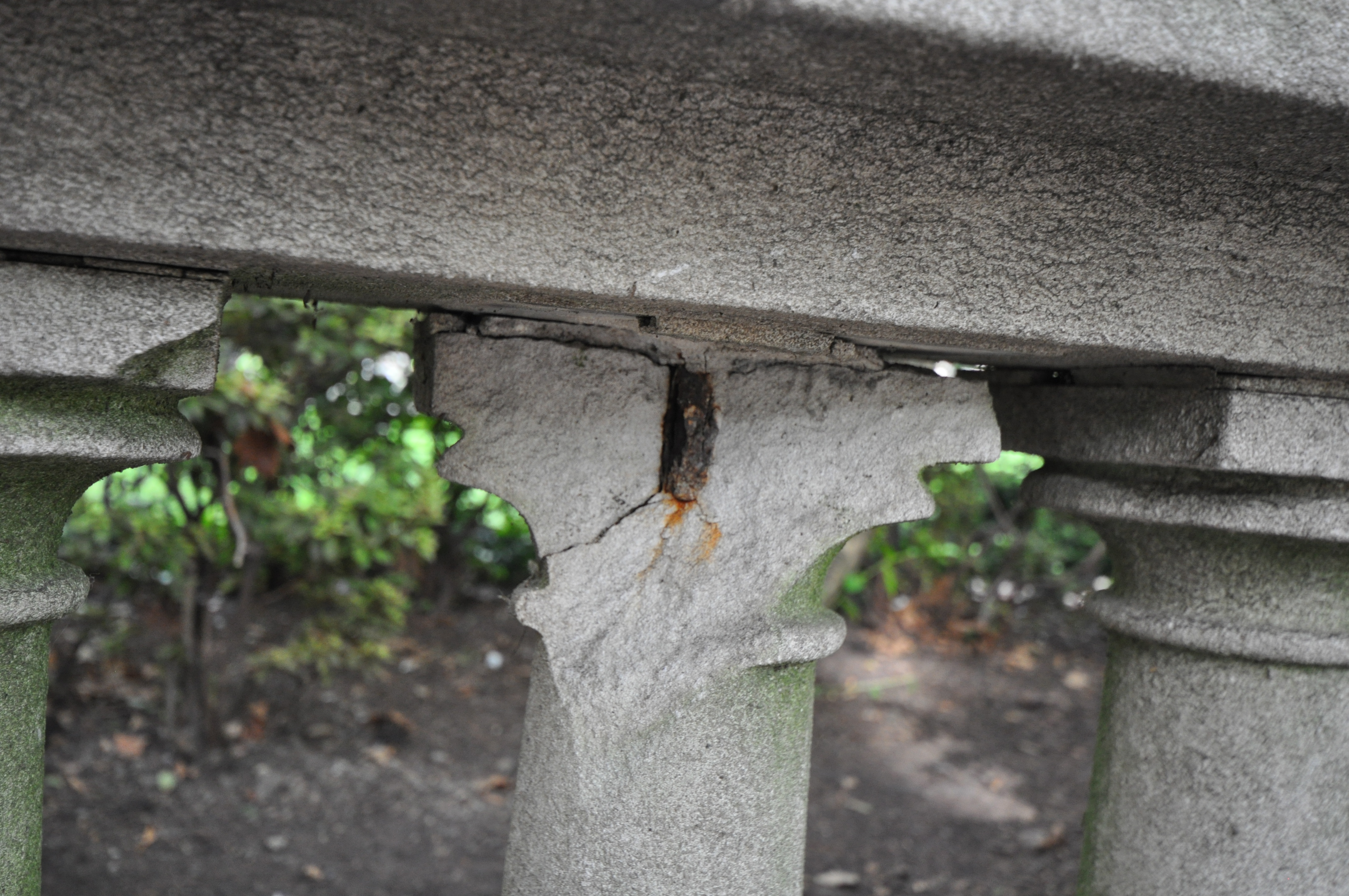 Figure 1:  Spalled stone due to rust jacking at a railing.  Credit:  Brian Rich, 2013 